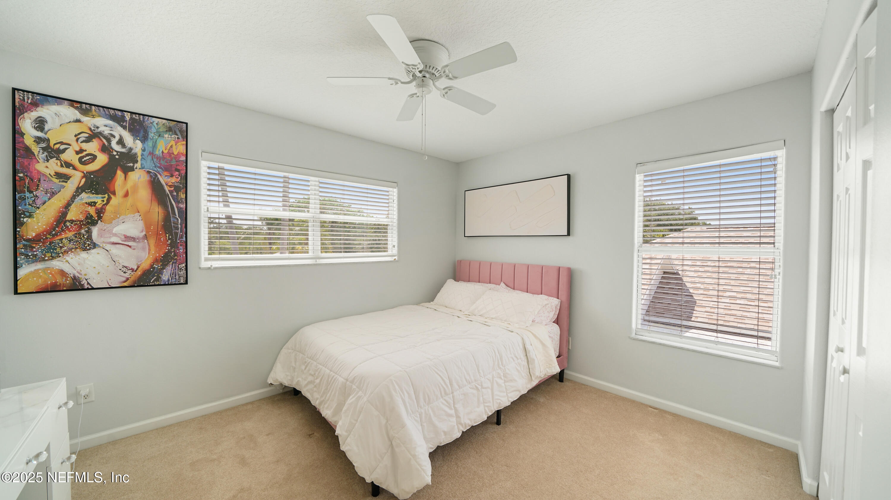 165 Cedar Ridge Circle St. Augustine, FL 32080 - Photo 28 of 46 a bedroom with a bed and a window