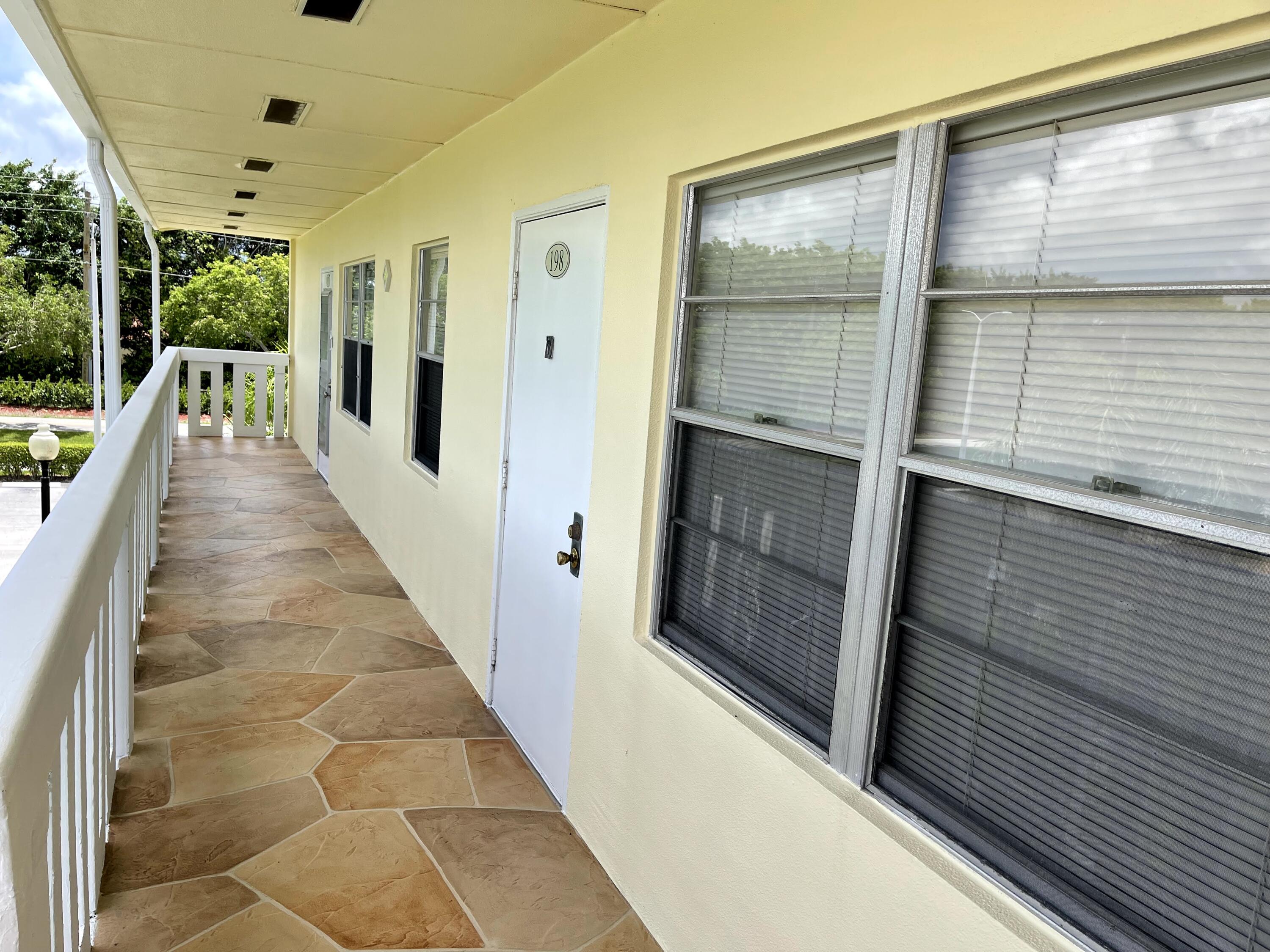198 Dorset East, Unit E Boca Raton, FL 33434 - Photo 19 of 23 a view of a porch