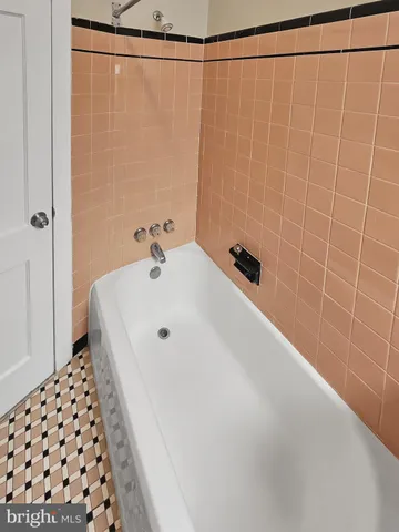 a bathroom with a sink and a shower curtain