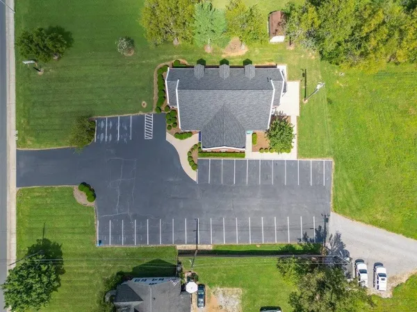 an aerial view of a house having swimming pool garden view