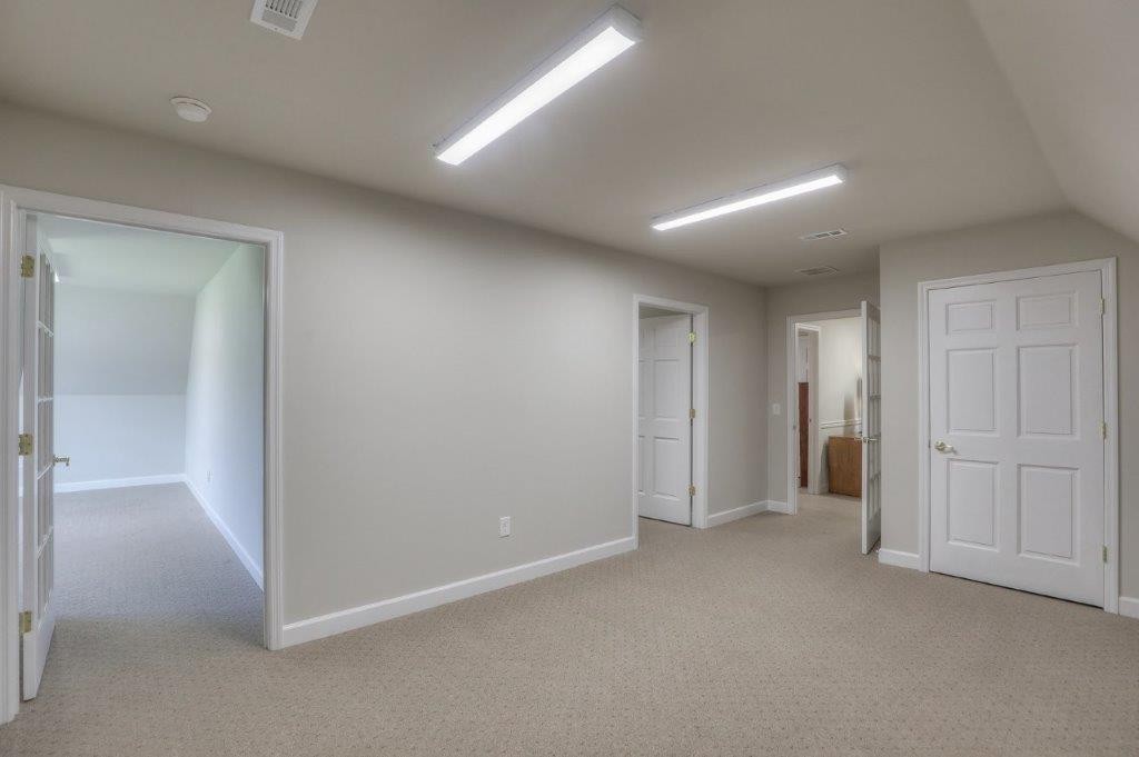 1404 North Main Street Shelbyville, TN 37160 - Photo 17 of 27 an empty room with closet and bathroom
