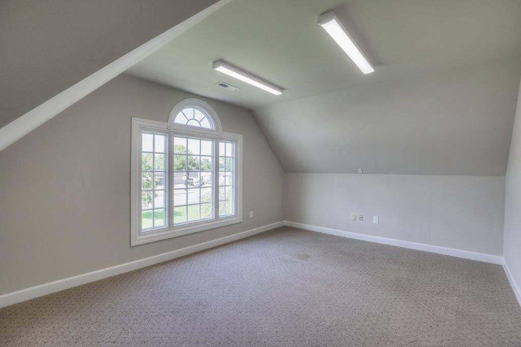 1404 North Main Street Shelbyville, TN 37160 - Photo 18 of 27 an empty room with a window