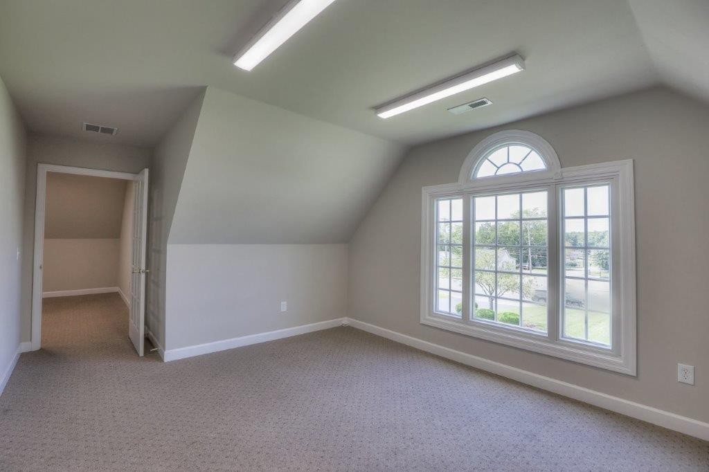 1404 North Main Street Shelbyville, TN 37160 - Photo 20 of 27 an empty room with a empty space and windows