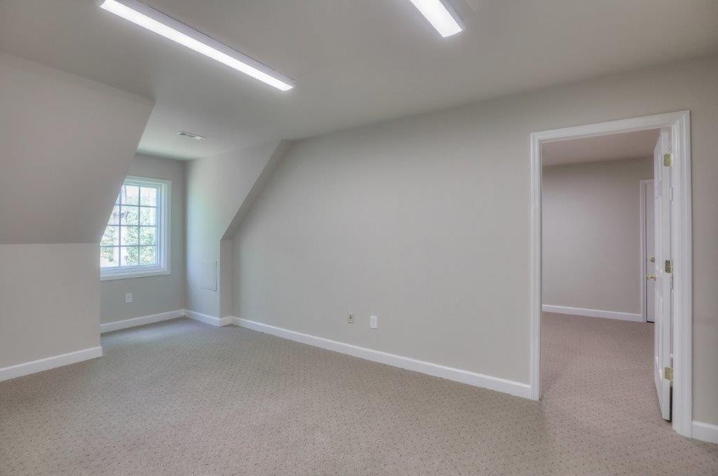 1404 North Main Street Shelbyville, TN 37160 - Photo 23 of 27 an empty room with windows and closet