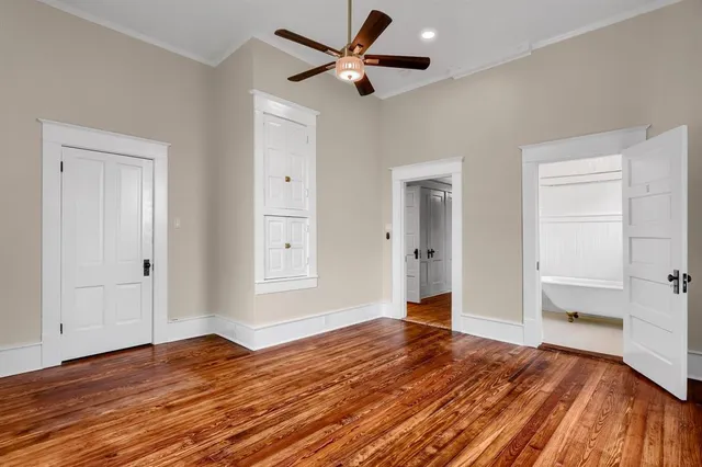 a en suite bathroom with a double vanity sink mirror and shower