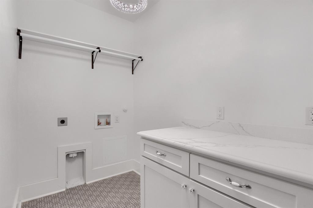 511 South Travis Street Sherman, TX 75090 - Photo 24 of 40 a view of a storage and utility room with closet