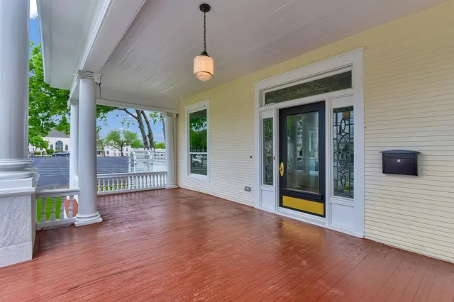 a view of livingroom with furniture and floor to ceiling window
