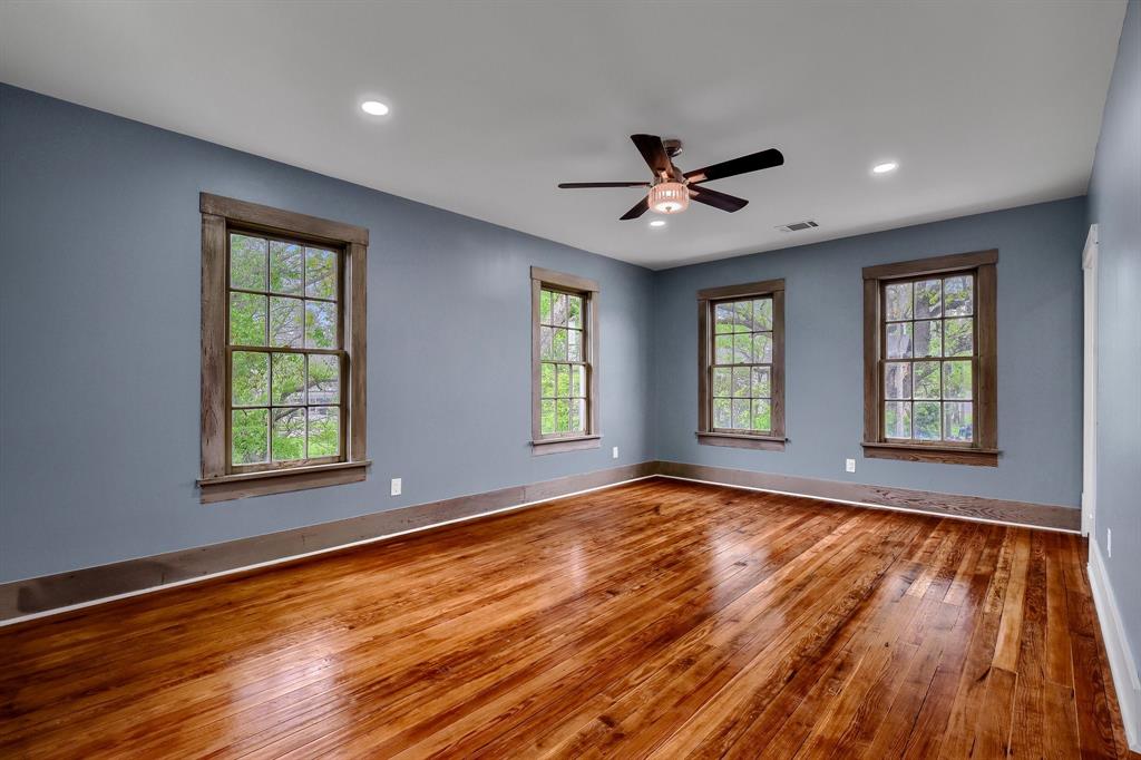 511 South Travis Street Sherman, TX 75090 - Photo 32 of 40 a view of room window and wooden floor