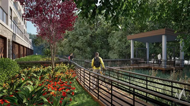 a view of a swimming pool with a patio and a garden