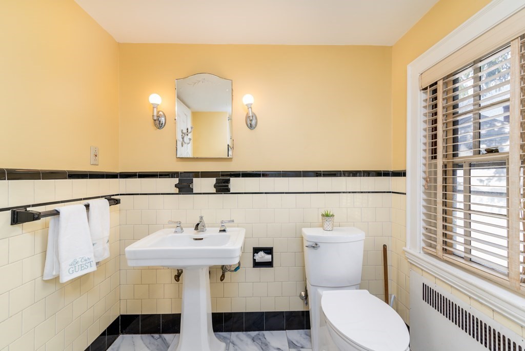 23 Appleton Avenue Beverly, MA 01915 - Photo 23 of 34 a bathroom with a sink and a mirror