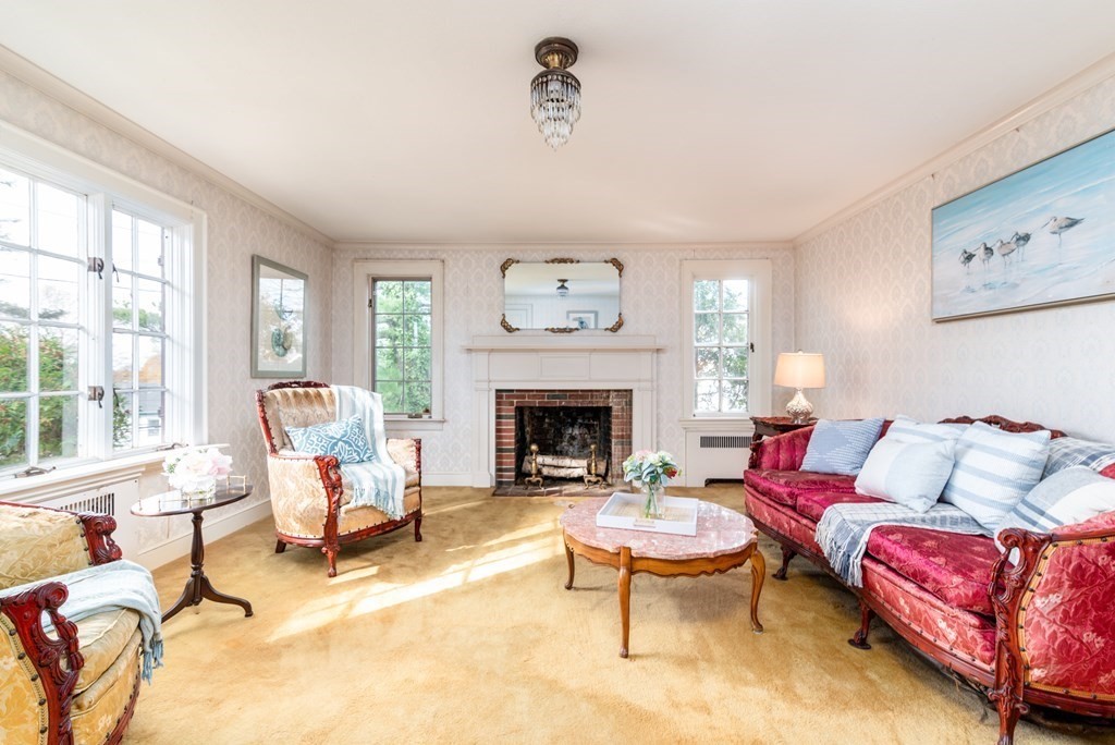 23 Appleton Avenue Beverly, MA 01915 - Photo 10 of 34 a living room with furniture fireplace and window