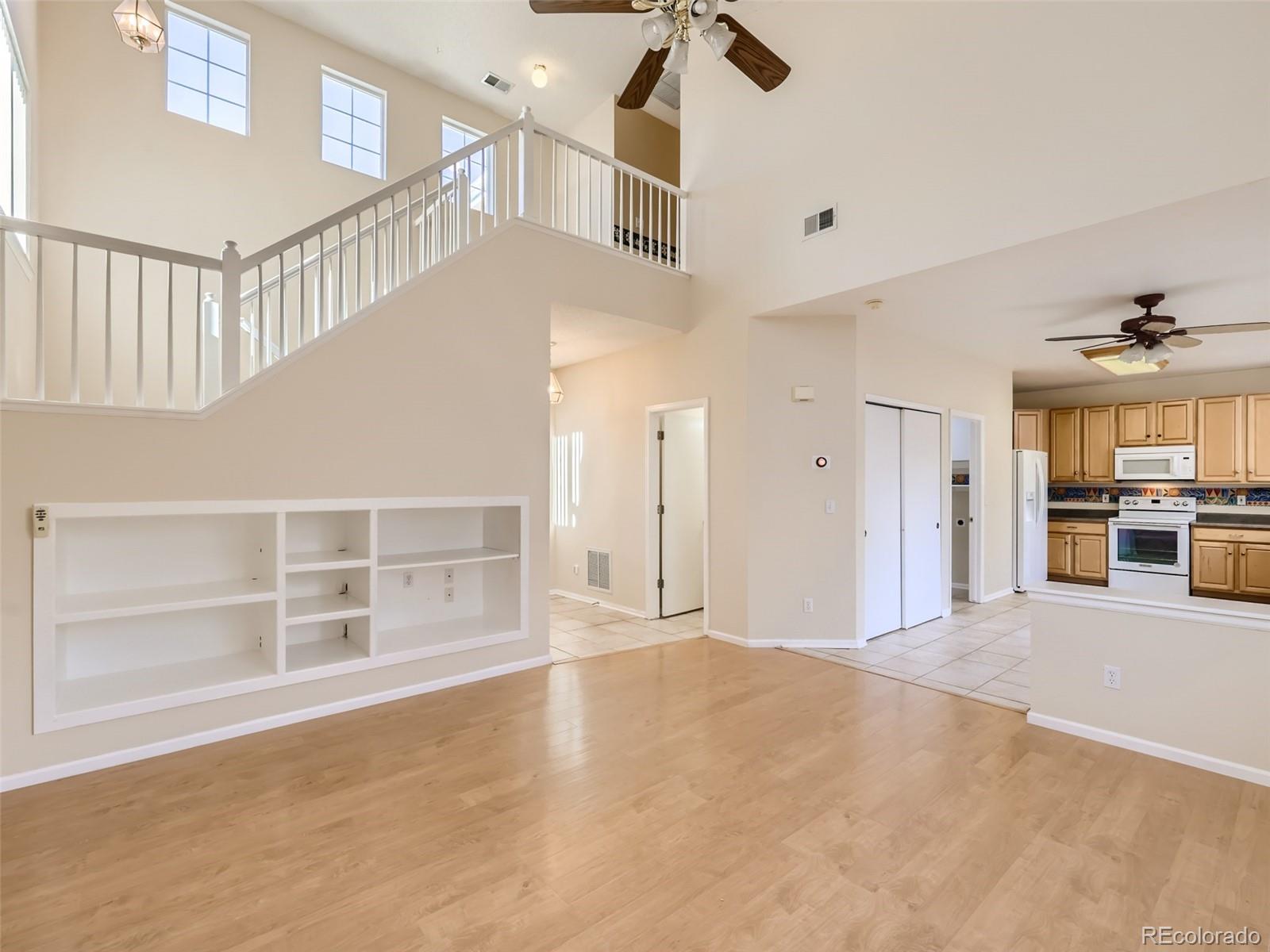 422 Chambers Way Aurora, CO 80011 - Photo 11 of 44 a view of an empty room with a window