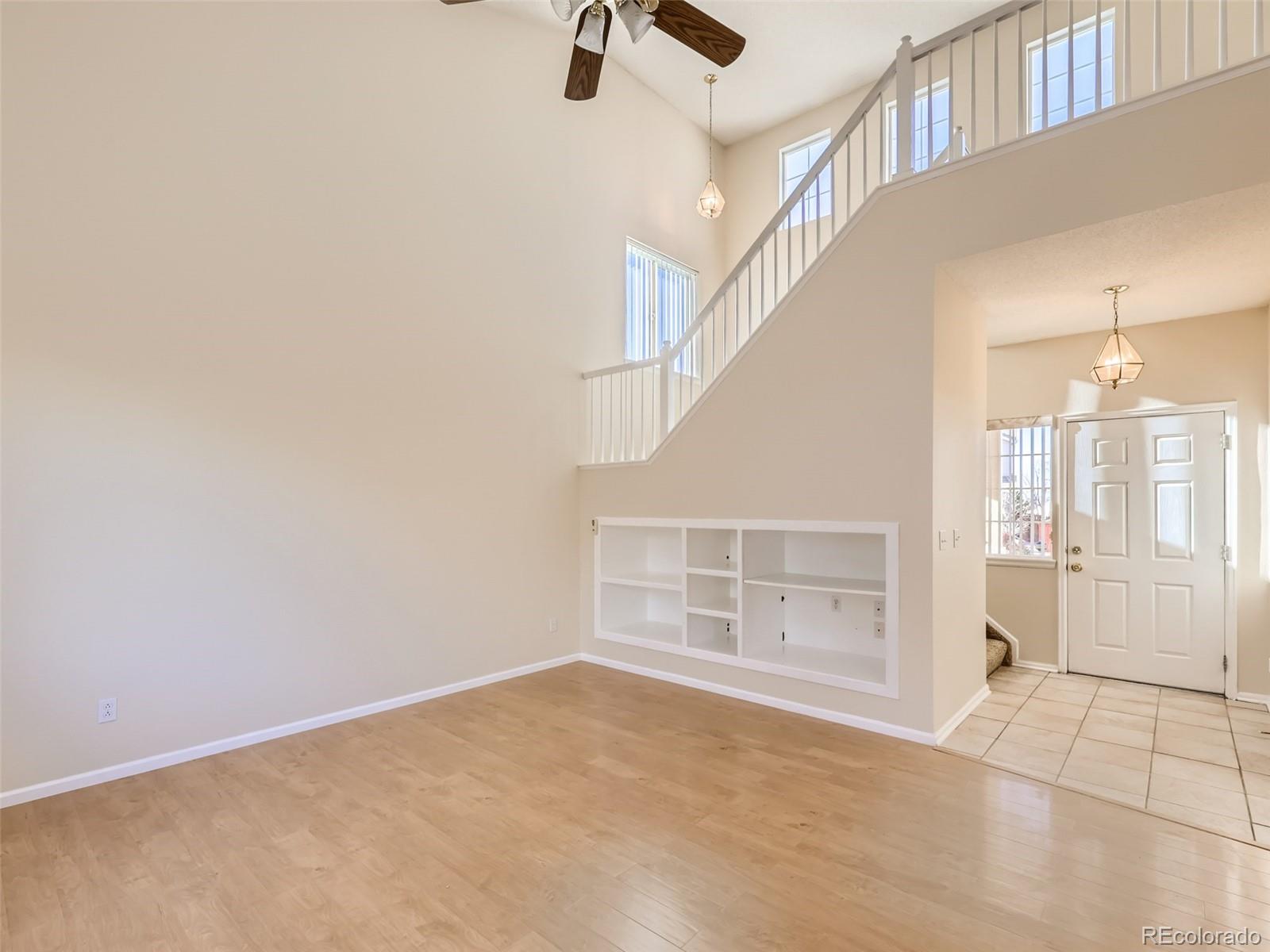 422 Chambers Way Aurora, CO 80011 - Photo 12 of 44 a view of an empty room with a window