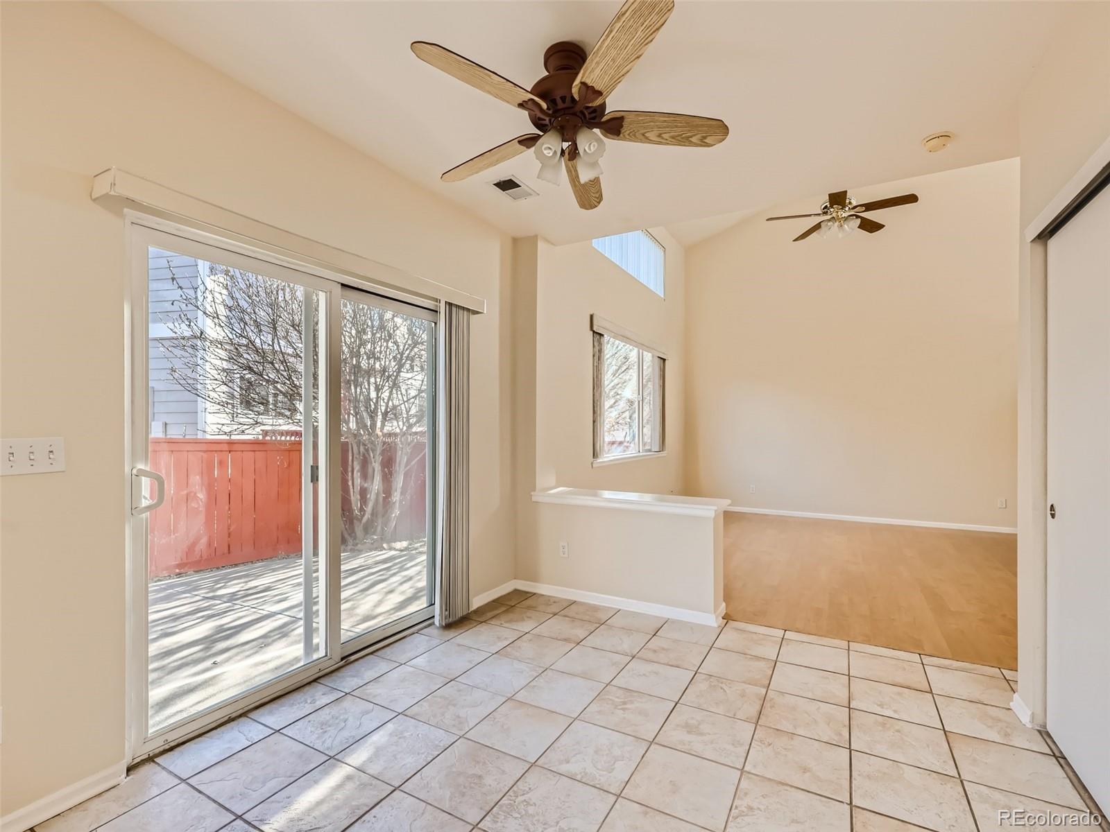 422 Chambers Way Aurora, CO 80011 - Photo 19 of 44 a view of an empty room with a window