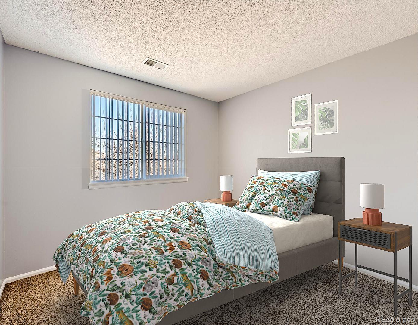 422 Chambers Way Aurora, CO 80011 - Photo 22 of 44 a bedroom with a bed and a window