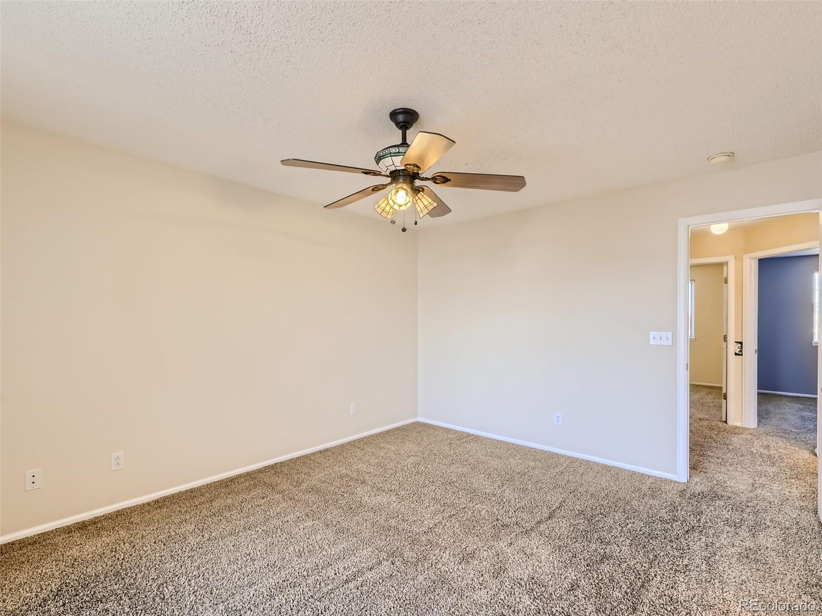 422 Chambers Way Aurora, CO 80011 - Photo 26 of 44 a window in an empty room
