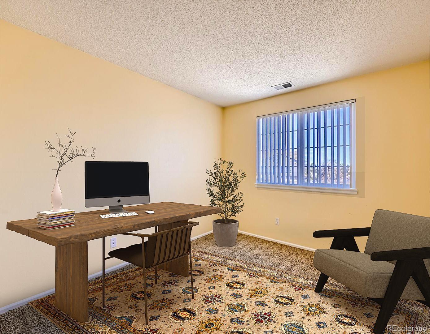 422 Chambers Way Aurora, CO 80011 - Photo 31 of 44 a workspace with furniture and lamp