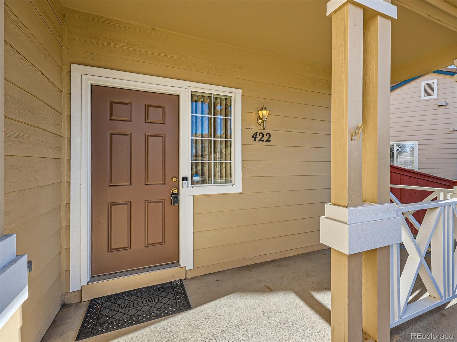 422 Chambers Way Aurora, CO 80011 - Photo 5 of 44 a view of front door of house