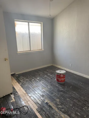 a view of a room with natural light