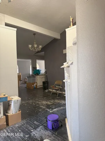 a view of a kitchen with furniture and window