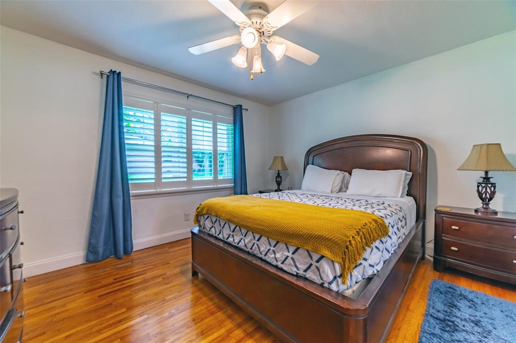 4201 West Dale Avenue Tampa, FL 33609 - Photo 30 of 77 a bedroom with a bed and window