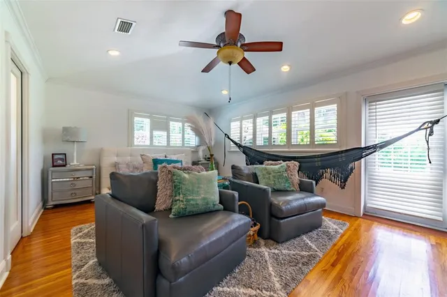 a bathroom with a toilet a sink and shower