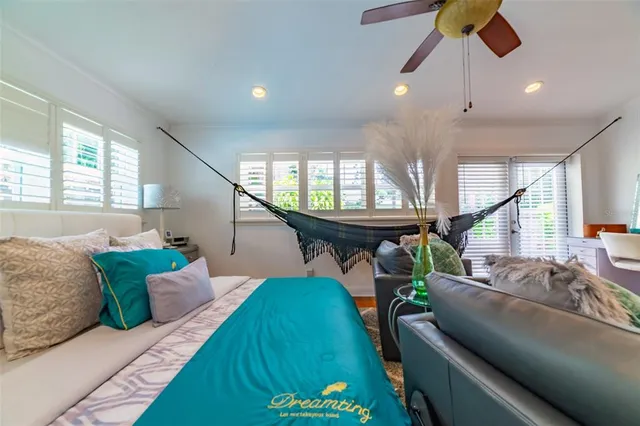 a backyard of a house with outdoor seating