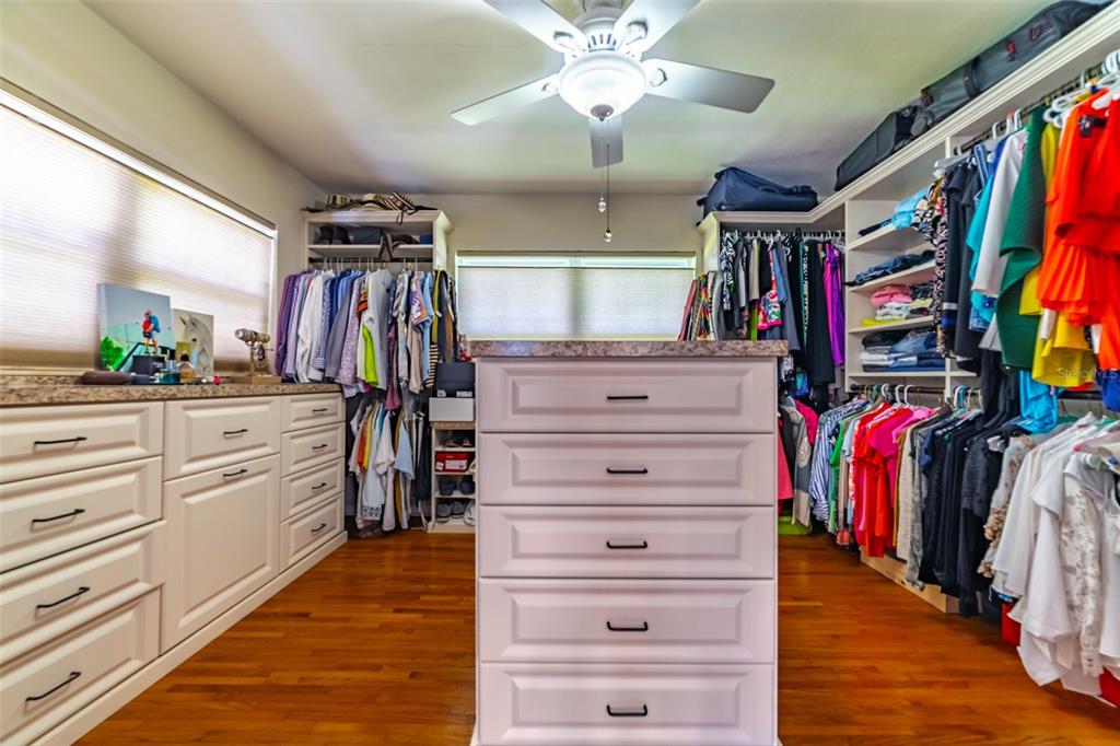 4201 West Dale Avenue Tampa, FL 33609 - Photo 36 of 77 a view of walk in closet with clothes and shoes