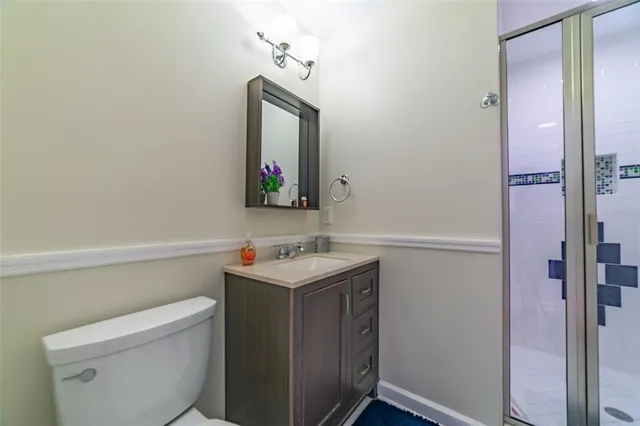 a view of a house with swimming pool and a garden