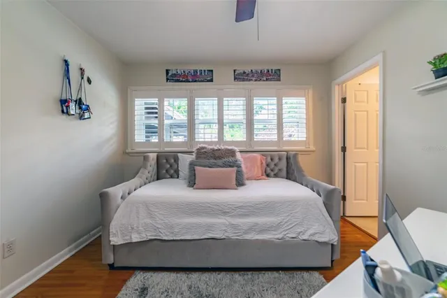 a backyard of a house with outdoor seating