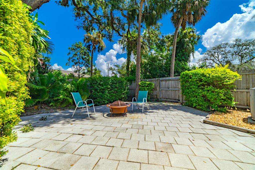 4201 West Dale Avenue Tampa, FL 33609 - Photo 52 of 77 a backyard of a house with outdoor seating