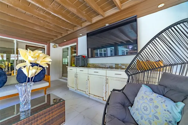 a view of a livingroom with furniture and a table