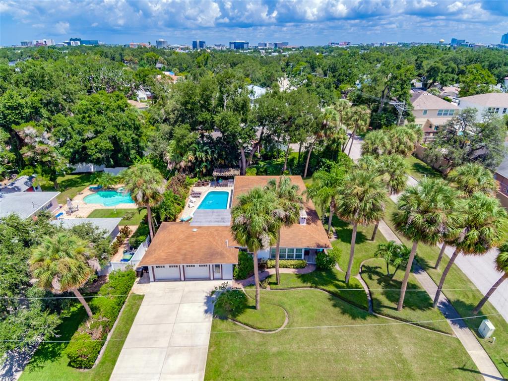 4201 West Dale Avenue Tampa, FL 33609 - Photo 71 of 77 an aerial view of a house with a yard and a yard