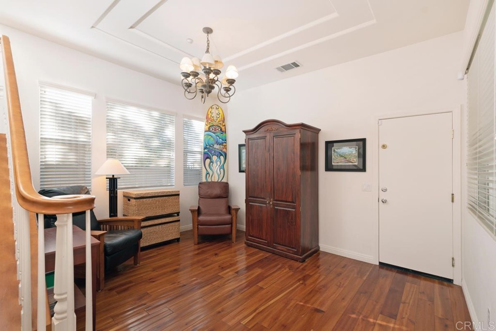 1445 Ranch Road Encinitas, CA 92024 - Photo 7 of 22 a view of a livingroom with furniture wooden floor and window