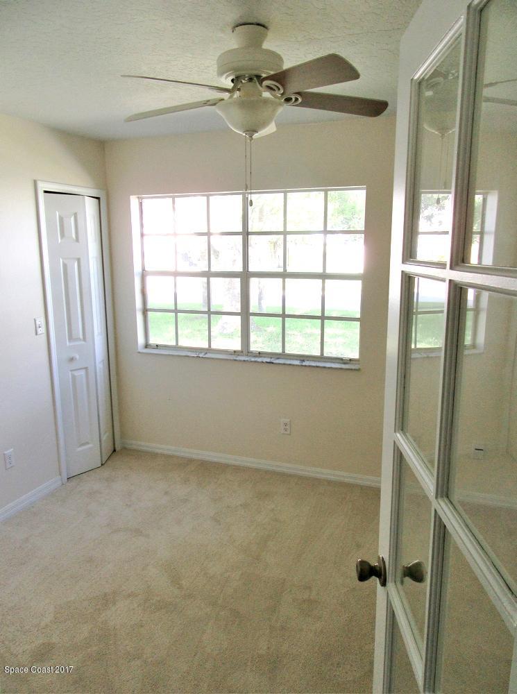 880 Evergreen Place Rockledge, FL 32955 - Photo 11 of 26 880Evergreen-FrontBed1