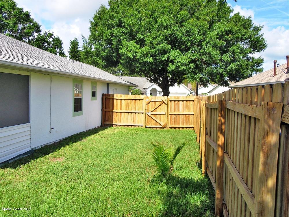 880 Evergreen Place Rockledge, FL 32955 - Photo 24 of 26 880Evergreen-SideYard1