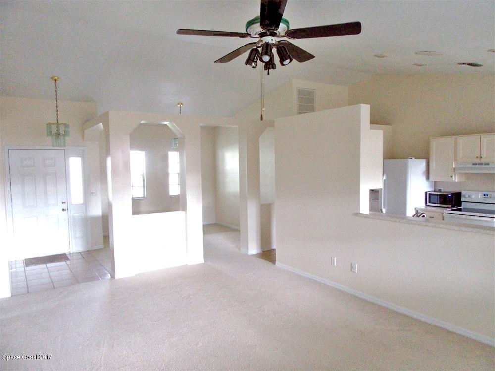 880 Evergreen Place Rockledge, FL 32955 - Photo 7 of 26 880Evergreen-Living1