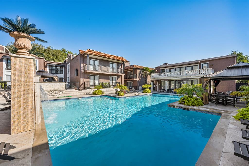 5934 Sandhurst Lane, Unit 109 Dallas, TX 75206 - Photo 11 of 14 a view of a house with a yard patio and sitting area