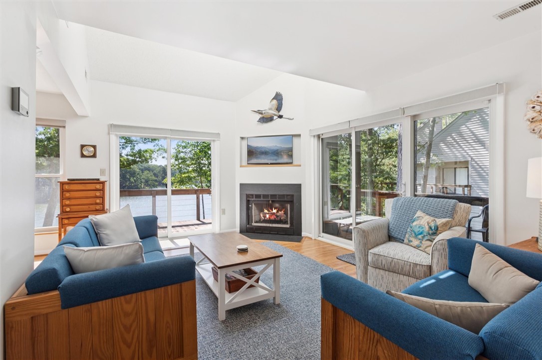 97 Villa Ridge Drive, Unit 2F Hartfield, VA 23071 - Photo 7 of 50 Spacious Living Room with views to the creek