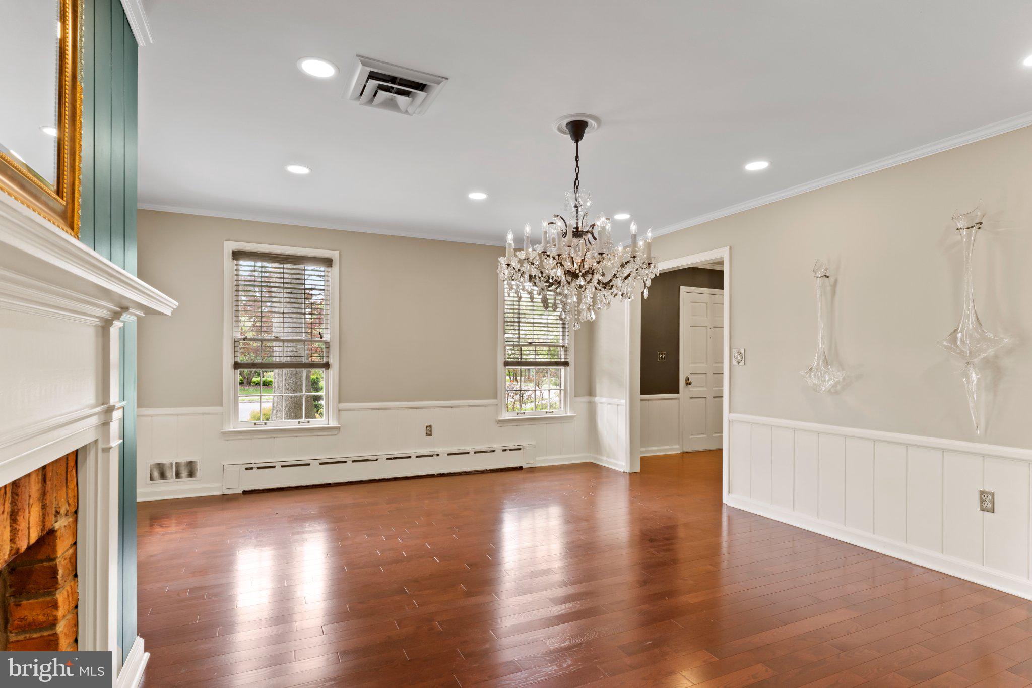 115 Kenwood Road Chambersburg, PA 17201 - Photo 13 of 74 a view of an empty room with wooden floor and a window