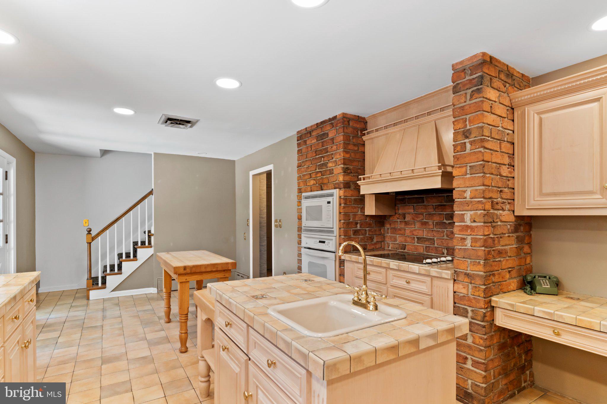 115 Kenwood Road Chambersburg, PA 17201 - Photo 35 of 74 a bathroom with a sink a toilet and mirror