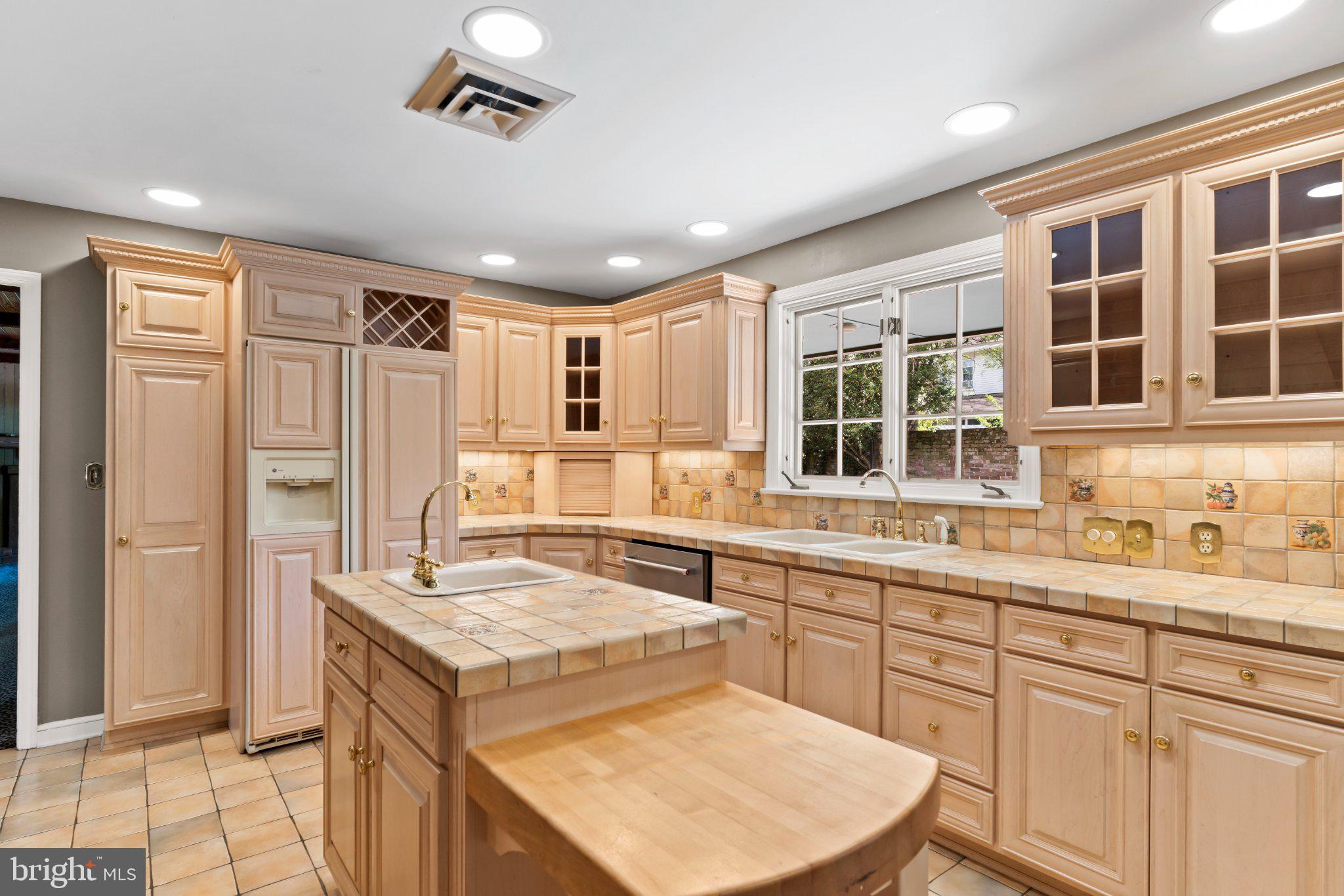115 Kenwood Road Chambersburg, PA 17201 - Photo 36 of 74 a kitchen with a stove sink and refrigerator