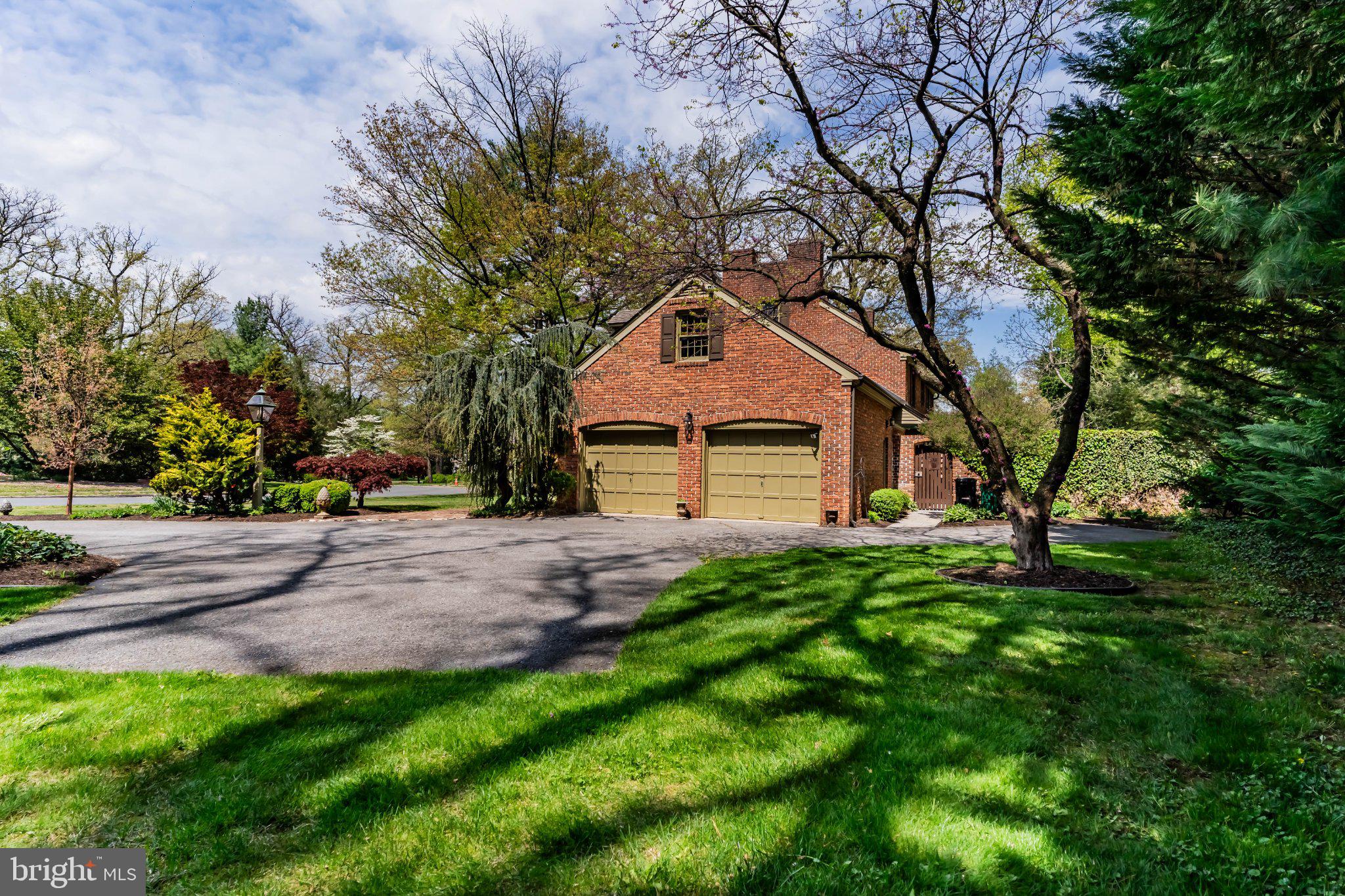 115 Kenwood Road Chambersburg, PA 17201 - Photo 69 of 74 a front view of a house with a yard and trees