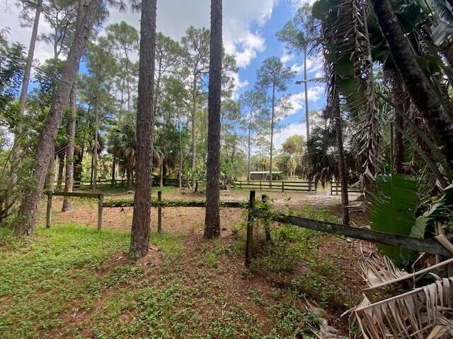 2141 B Road, Unit STUDIO 1 Loxahatchee Groves, FL 33470 - Photo 39 of 40 a view of park with trees
