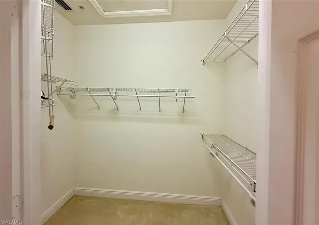 a view of a room with racks on the wall
