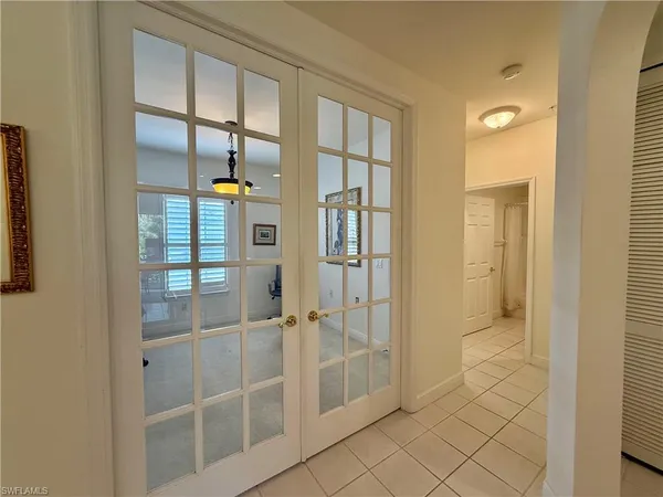 a bathroom with a shower and a sink