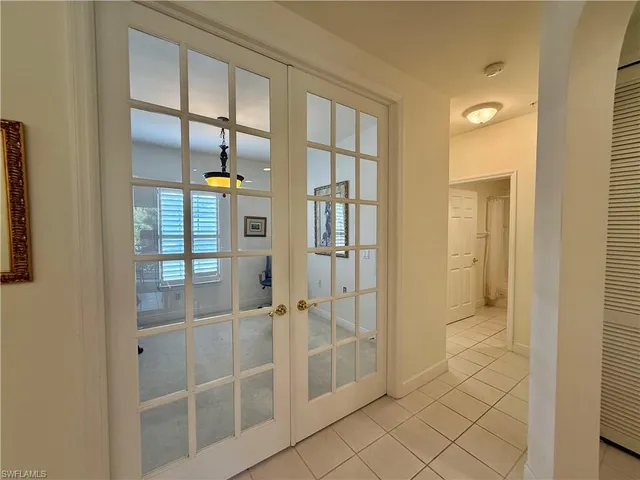 a bathroom with a shower and a sink