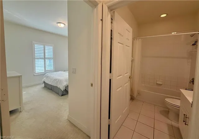 a spacious bathroom with a shower and a tub