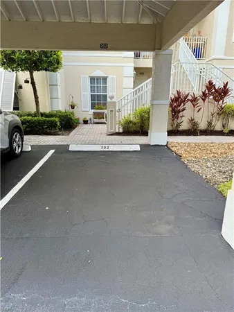 a view of a house with a garden