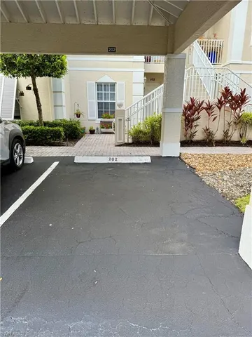 a view of a house with a garden